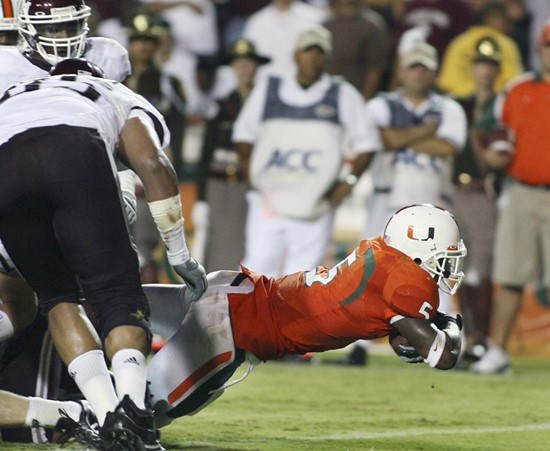 Miami running back Javarris James scores a touchdown during the second quarter against Texas A&M. (AP Photo/Luis M. Alvarez)