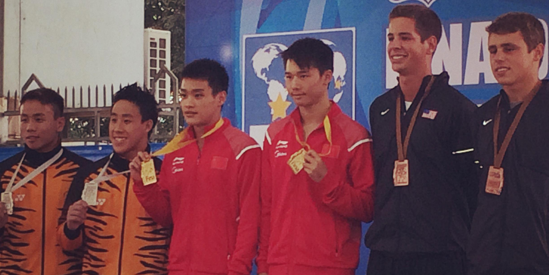 Cousineau, Wilfong Earn Medals in Malaysia