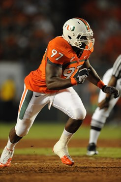 University of Miami Hurricanes defensive lineman Adewale Ojomo #97 plays in a game against the Florida A&amp;M Rattlers at Sun Life Stadium on...