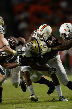 University of Miami Hurricanes linebacker Thurston Ambrister #34 plays in a game against The Pittsburgh Panthers at Sun Life Stadium on November 29,...
