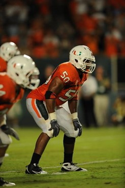 University of Miami Hurricanes linebacker Darryl Sharpton plays in a game against the Georgia Tech Yellow Jackets at Land Shark Stadium on September...