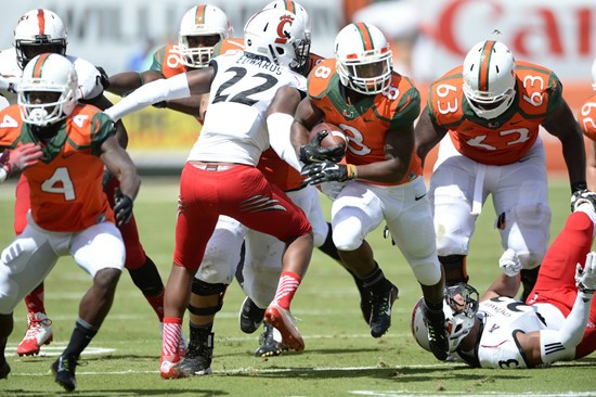 University of Miami Hurricanes running back Duke Johnson #8 plays in a game against the Cincinnati Bearcats at Sun Life Stadium on October 11, 2014.  ...