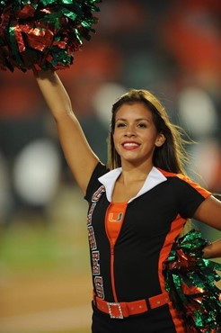 University of Miami Hurricane cheerleader&acirc;?<sup>TM</sup>s show their team spirit in a game against the Georgia Tech Yellow Jackets at Land Shark...