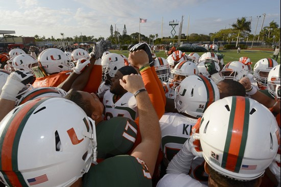 The Canes huddled before Friday's scrimmage