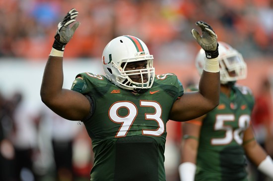 University of Miami Hurricanes defensive lineman Calvin Heurelou #93 plays in a game against the Arkansas State Red Wolves at Sun Life Stadium on...