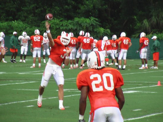 Kyle Wright (3) launches a pass to Terrell Walden (20).