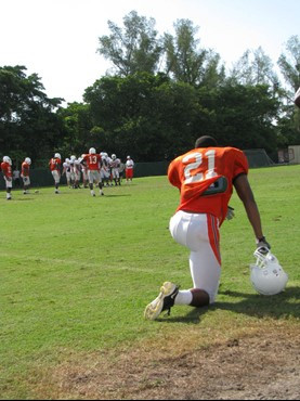 Brandon McGee (21) looks on at practice Wednesday morning at the Greentree Practice Fields.