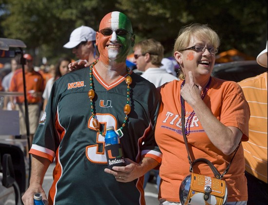 Jim and Bonnie Hill prepare for the Miami-Clemson NCAA college football game in Clemson, S.C., Saturday, Oct. 2, 2010. (AP Photo/Patrick Collard)