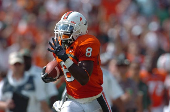 University of Miami wide receiver Darnell Jenkins #8 catches a pass from quarterback Kirby Freeman #7 in a game against the North Carolina State...