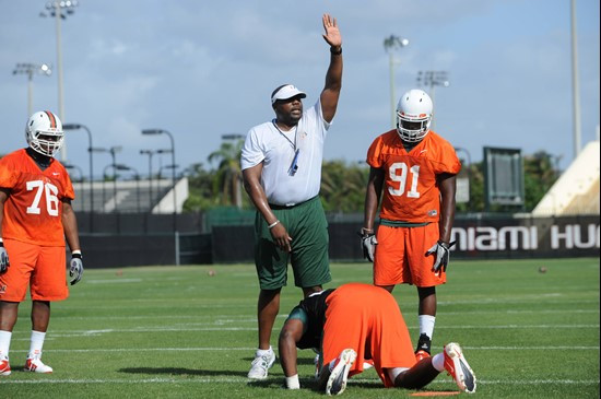 University of Miami Defenisve Line Coach, Jethro Franklin, instructs his team on how he wants them to execute his game plan during a spring practice...