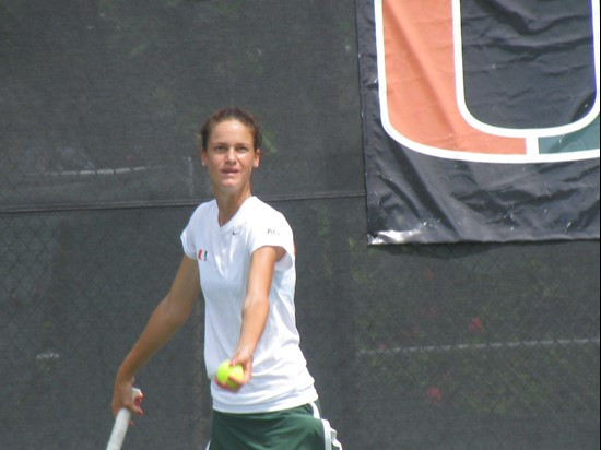 Bistra Otashlyska seving in doubles play Saturday at the Neil Schiff Tennis Center.