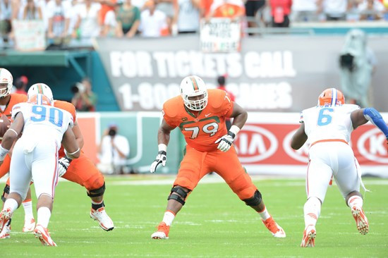 University of Miami Hurricanes offensive lineman Malcolm Bunche #79 gets set to block against the #12 ranked University of Florida Gators at Sun Life...