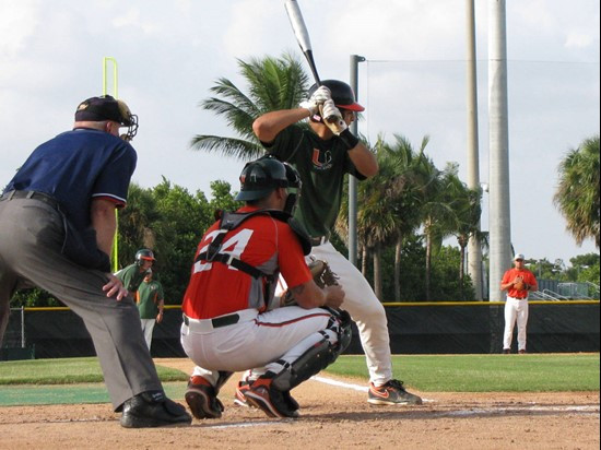Yasmani Grandal (24) and Patrick Donabedian at the Orange-Green World Series on Monday.