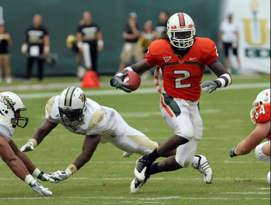 Greg Cooper runs for the first down as pursues during second quarter.