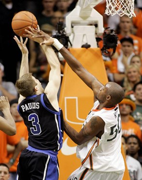Duke's Greg Paulus (3) prepares to shoot against Miami's Anthony King in the first half of a basketball game in Coral Gables, Fla., Wednesday, Feb....