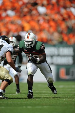 University of Miami Hurricanes defensive lineman Steven Wesley #90 plays in a game against the Deamon Deacons of Wake Forest at Dolphin Stadium on...