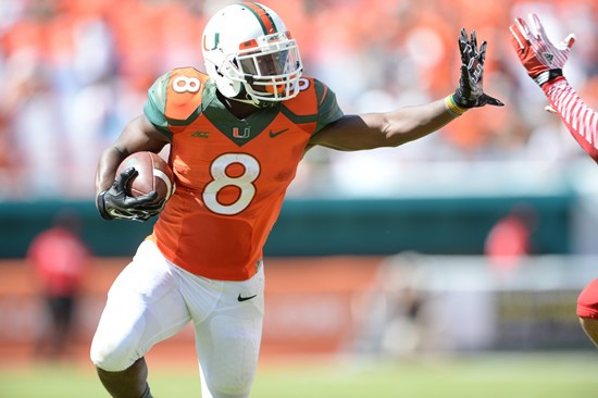 Duke Johnson #8 and the University of Miami Hurricanes play host to the Cincinnati Bearcats at Sun Life Stadium on October 11, 2014. Photo by Matthew...