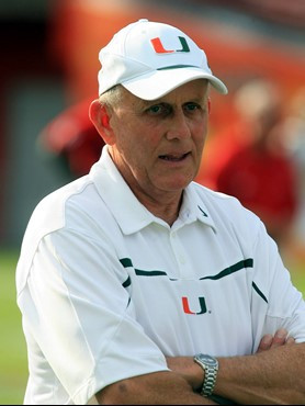 Larry Coker watches his team warm up before the game. (AP Photo/Luis M. Alvarez)