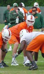 Spring Football Practice Continues In The Rain