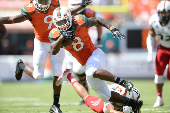 Duke Johnson #8 and the University of Miami Hurricanes play host to the Cincinnati Bearcats at Sun Life Stadium on October 11, 2014. Photo by Matthew...