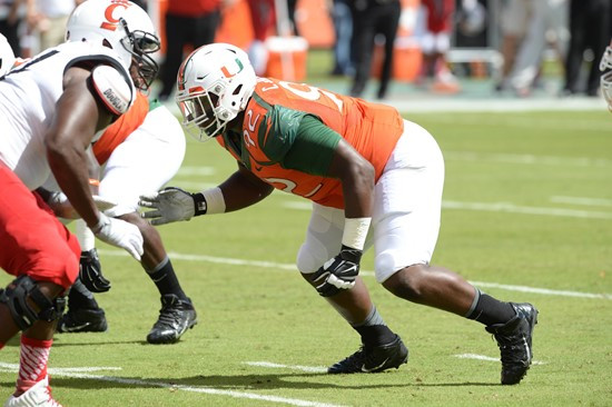  University of Miami Hurricanes defensive lineman Courtel Jenkins #92 plays in a game against the Cincinnati Bearcats at Sun Life Stadium on October...