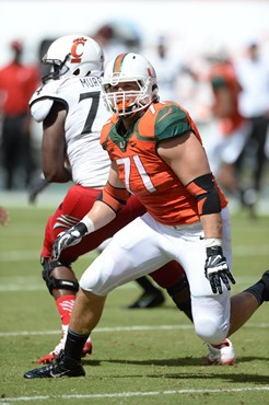 University of Miami Hurricanes defensive lineman Anthony Chickillo #71 plays in a game against the Cincinnati Bearcats at Sun Life Stadium on October...