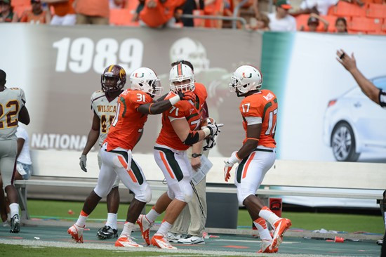 University of Miami Hurricanes defensive lineman Anthony Chickillo #71 plays in a game against the Bethune Cookman Wildcats at Sun Life Stadium on...