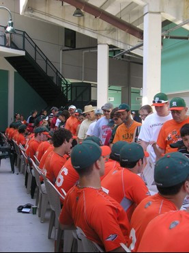 The 2009 team signing autographs on Saturday