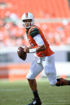 University of Miami Hurricanes quarterback Brad Kaaya #15 plays in a game against the Cincinnati Bearcats at Sun Life Stadium on October 11, 2014. ...
