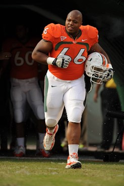 University of Miami Hurricanes offensive lineman Harland Gunn #66 gets set to block in a game against the Boston College Eagles at Sun Life Stadium on...