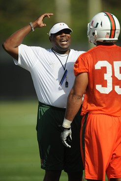 University of Miami Defenisve Line Coach, Jethro Franklin, instructs his team on how he wants them to execute his game plan during a spring practice...