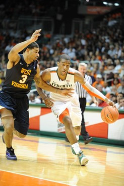 University of Miami Hurricanes guard, Garrius Adams #25 and Reggie Johnson #42, play host to 2010 NCAA Final Four participant West Virginia at the...