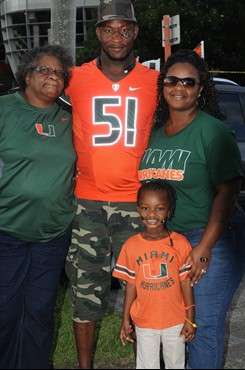 University of Miami Hurricane fans show their team spirit in a game against the Savannah State Tigers at Sun Life Stadium on September 21, 2013. ...