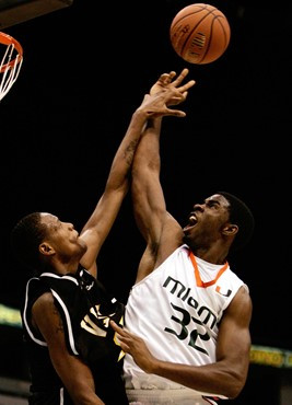 Brian Asbury is fouled by VCU's Michael Anderson during the second half. (AP Photo/Andres Leighton)