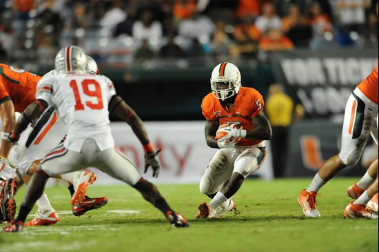 University of Miami Hurricanes running back Mike James #5 carries the ball against the Ohio State Buckeyes at Sun Life Stadium on September 17, 2011. ...