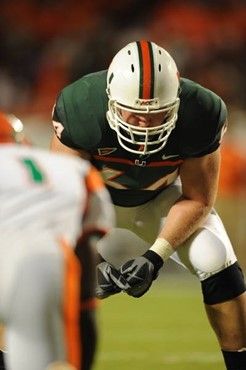 University of Miami Hurricanes offensive tackle Jason Fox #64 plays in a game against the Florida A&M Rattlers at Land Shark Stadium on October 10,...
