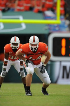 University of Miami Hurricanes offensive tackle Jason Fox #64 plays in a game against the University of Central Florida Knights at Dolphin Stadium on...