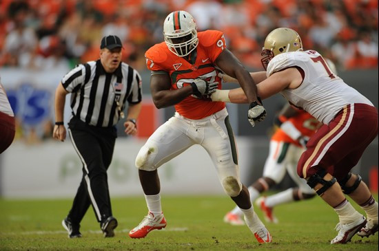 University of Miami Hurricanes defensive lineman Adewale Ojomo #97 plays in a game against the Boston College Eagles at Sun Life Stadium on November...