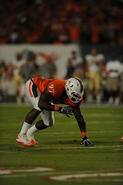 University of Miami Hurricanes defensive lineman Adewale Ojomo #97 plays in a game against the Florida State Seminoles at Sun Life Stadium on October...