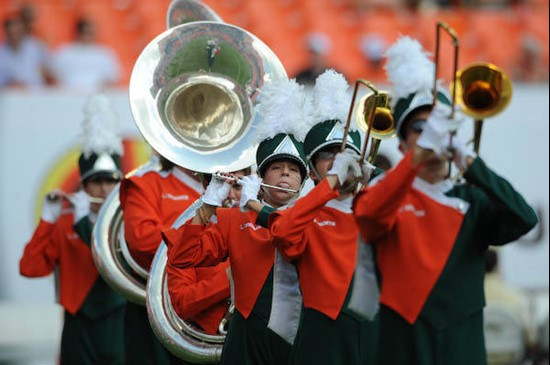 A University of Miami Band of the Hour participant entertains the crowd in a game against the Deamon Deacons of Wake Forest at Dolphin Stadium on...
