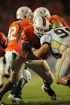 University of Miami Hurricanes guard A.J. Trump #70 plays in a game against the Georgia Tech Yellow Jackets at Land Shark Stadium on September 17,...
