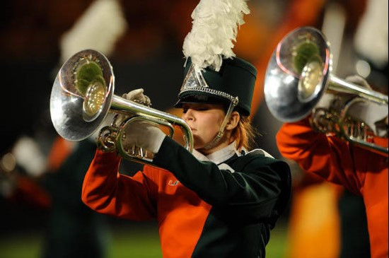 A University of Miami Band of the Hour participant entertains the crowd in a game against the Virginia Tech Hokies at Dolphin Stadium on November 13,...