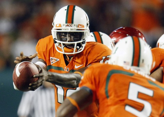 Jacory Harris hands off to running back Javarris James.
