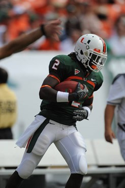 University of Miami Hurricanes running back Graig Cooper #2 plays in a game against the Deamon Deacons of Wake Forest at Dolphin Stadium on October...