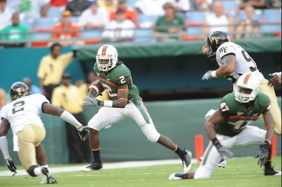 University of Miami Hurricanes running back Graig Cooper #2 plays in a game against the Deamon Deacons of Wake Forest at Dolphin Stadium on October...