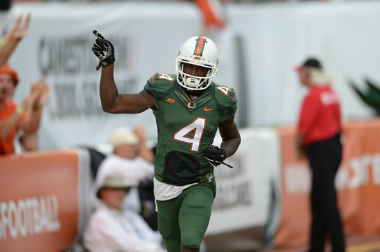 University of Miami Hurricanes wide receiver Phillip Dorsett #4 plays in a game against the Arkansas State Red Wolves at Sun Life Stadium on...