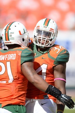 University of Miami Hurricanes linebacker Thurston Ambrister #34 plays in a game against the Cincinnati Bearcats at Sun Life Stadium on October 11,...