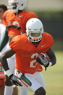 University of Miami Hurricanes running back Graig Cooper #2 practices at Greentree Practice Field on August 13 in afternoon drills to prepare for the...