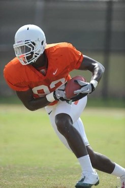 University of Miami Hurricanes tight end Cleveland Assante #82 catches a pass during an after practice at Greentree Practice Field on August 13 to...