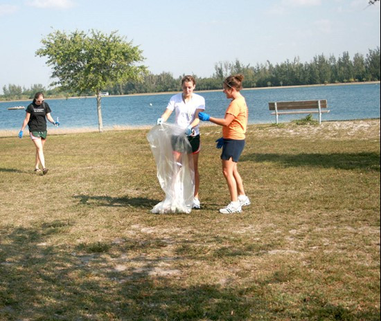 UM Staff, Coaches & Student Athletes volunteer at Amelia Earhart Park Community Service Project.